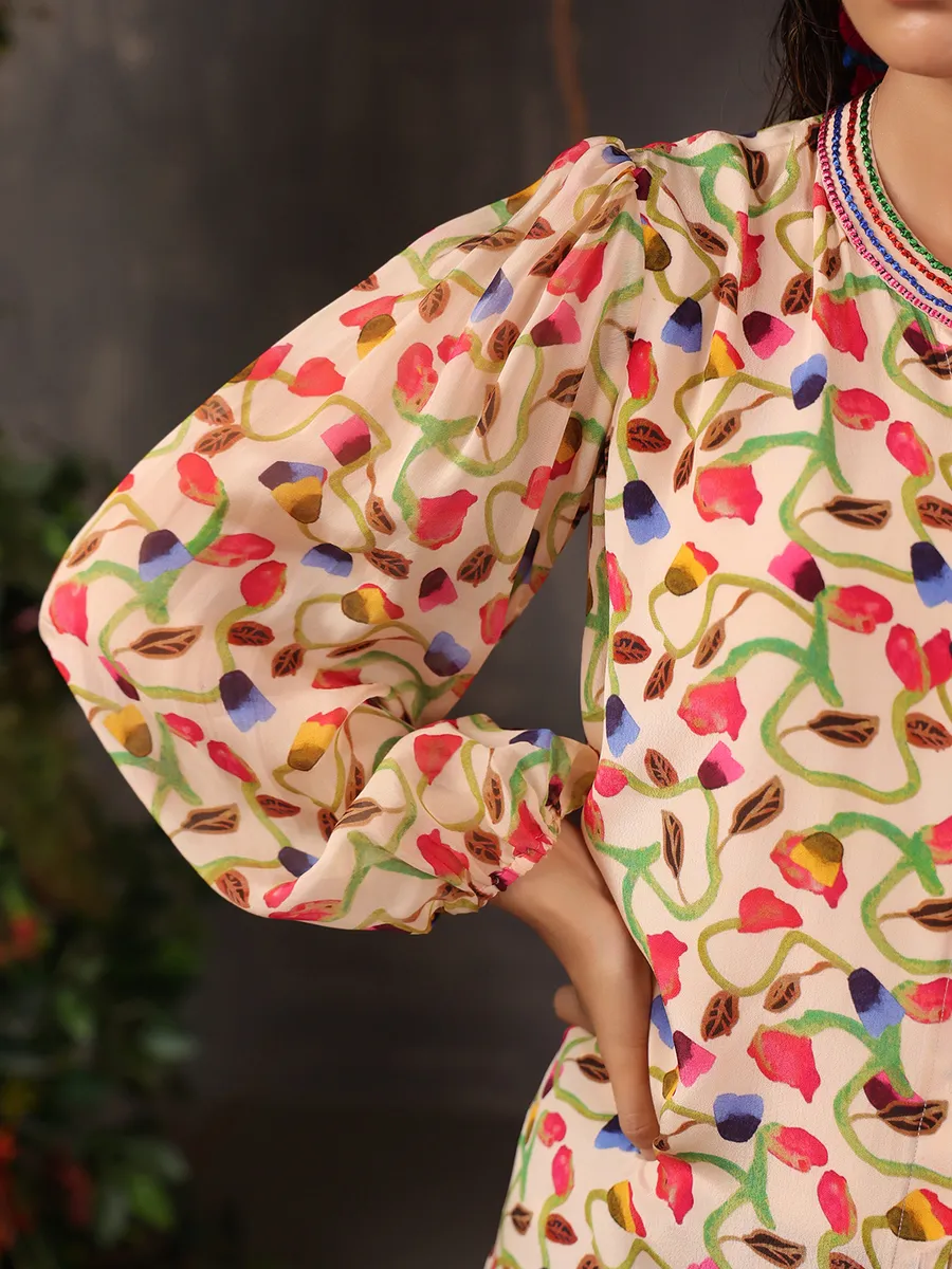 Stylish beige silk top with print