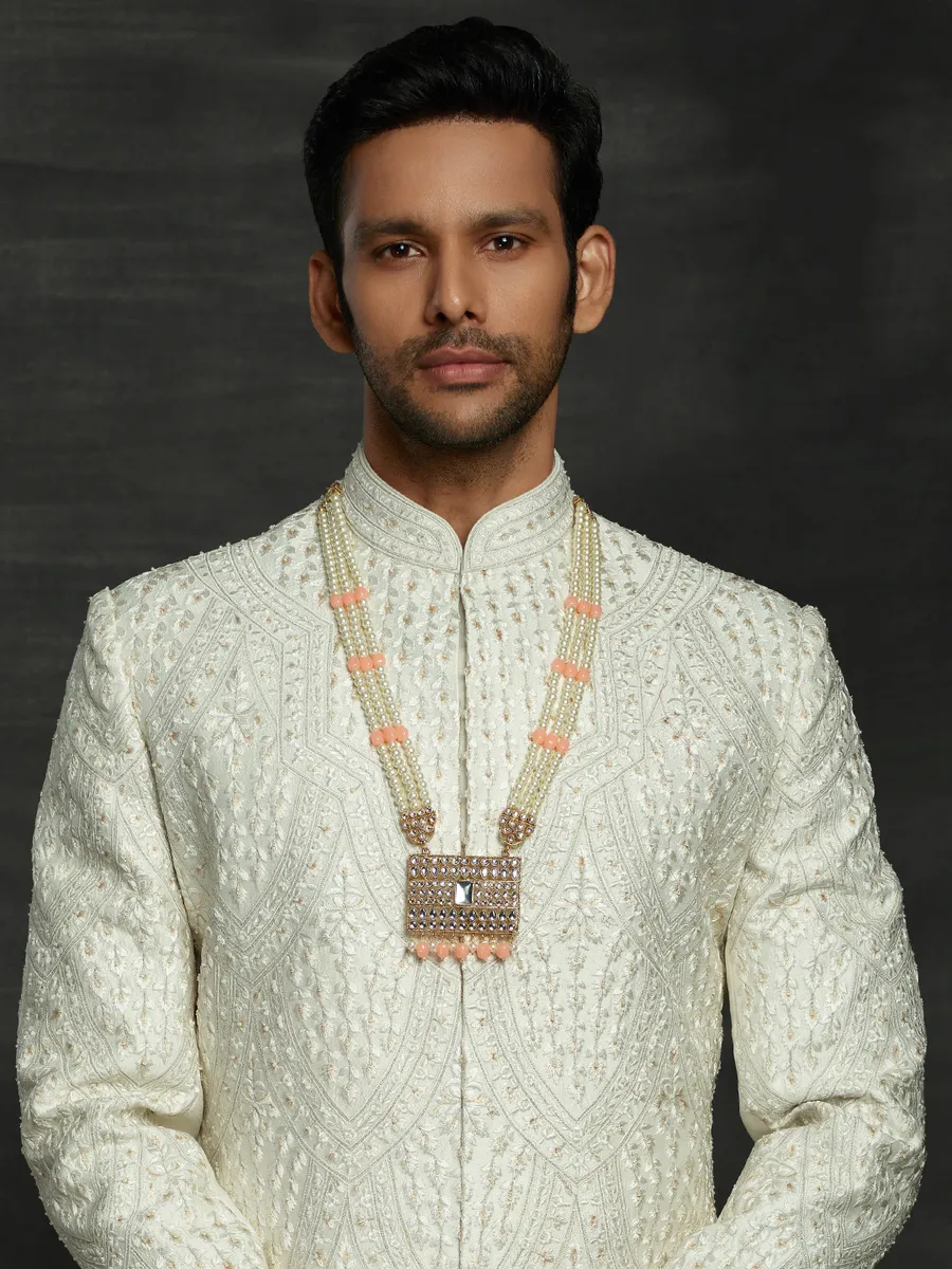 Stylish off white silk double layer sherwani for groom