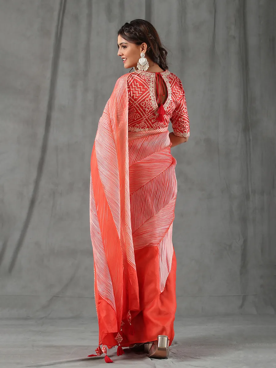 Stylish orange half n half saree