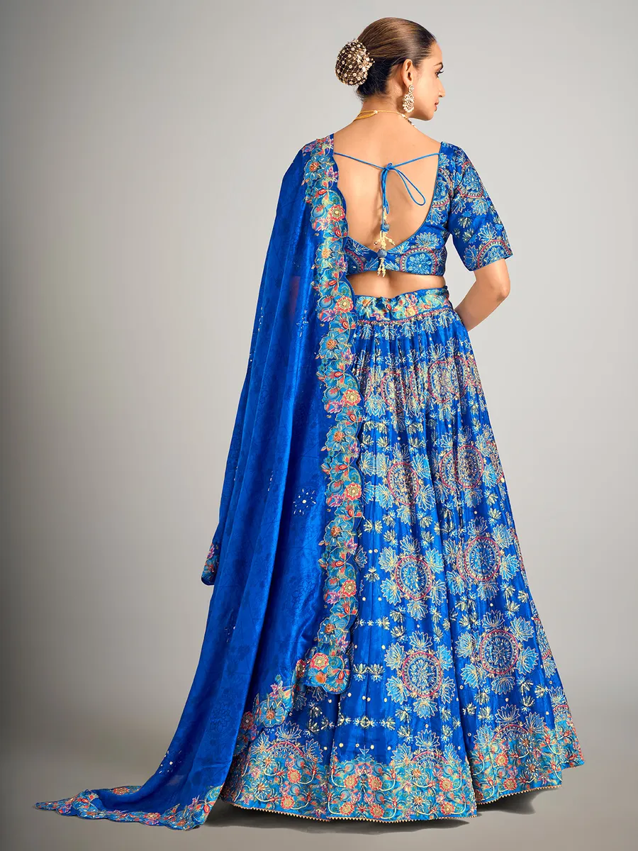 Teal blue printed silk wedding wear lehenga choli