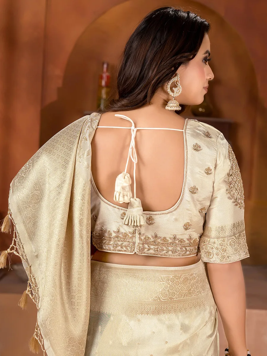 Tissue silk cream saree for wedding