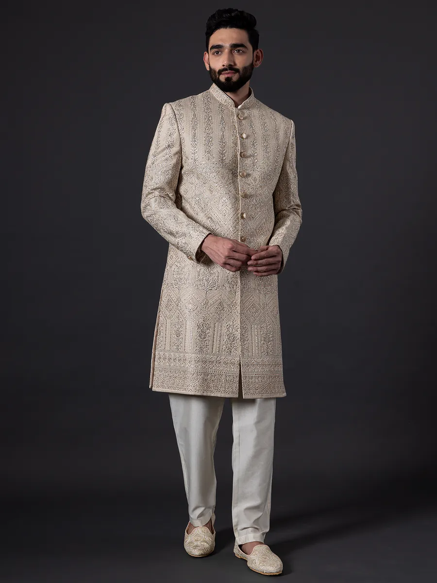 Traditional glimmerish beige silk sherwani for groom