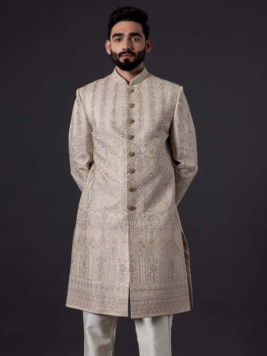 Traditional glimmerish beige silk sherwani for groom