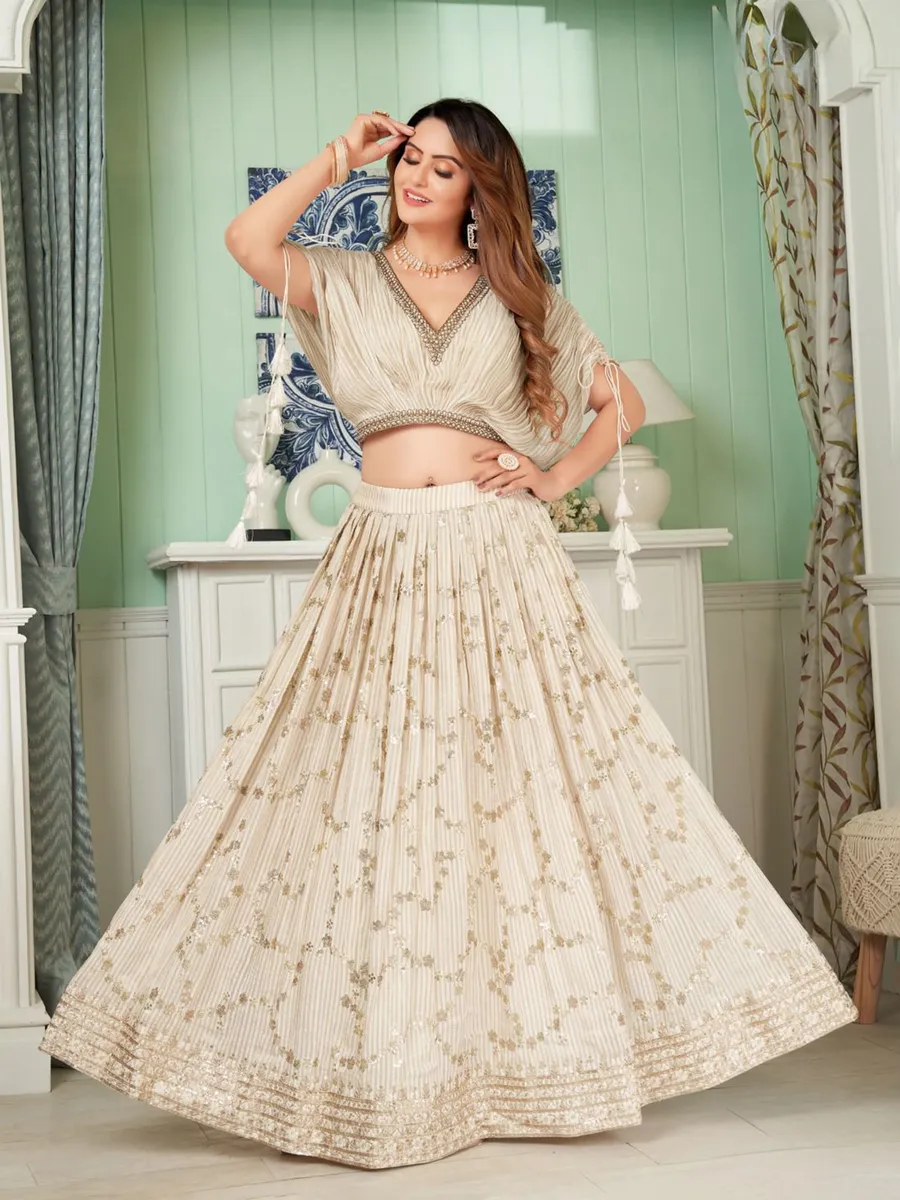 Trendy cream georgette crop top with lehenga