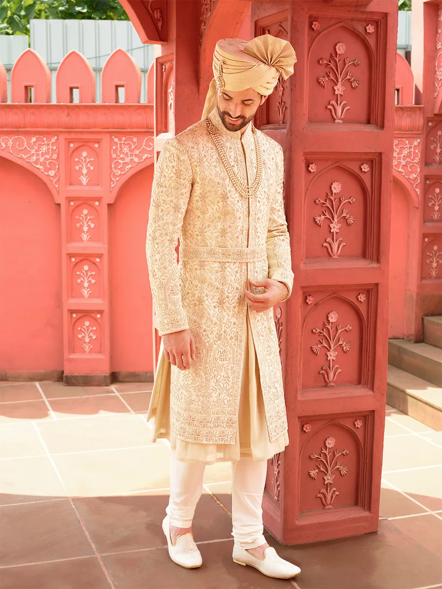 Trendy cream groom sherwani in raw silk