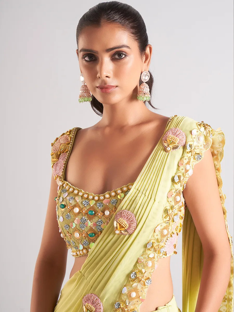 Trendy light green georgette saree