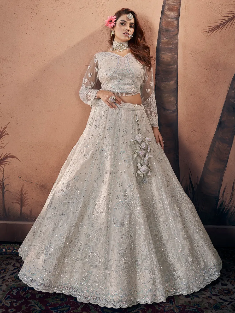 Trendy off-white net lehenga choli for bridal