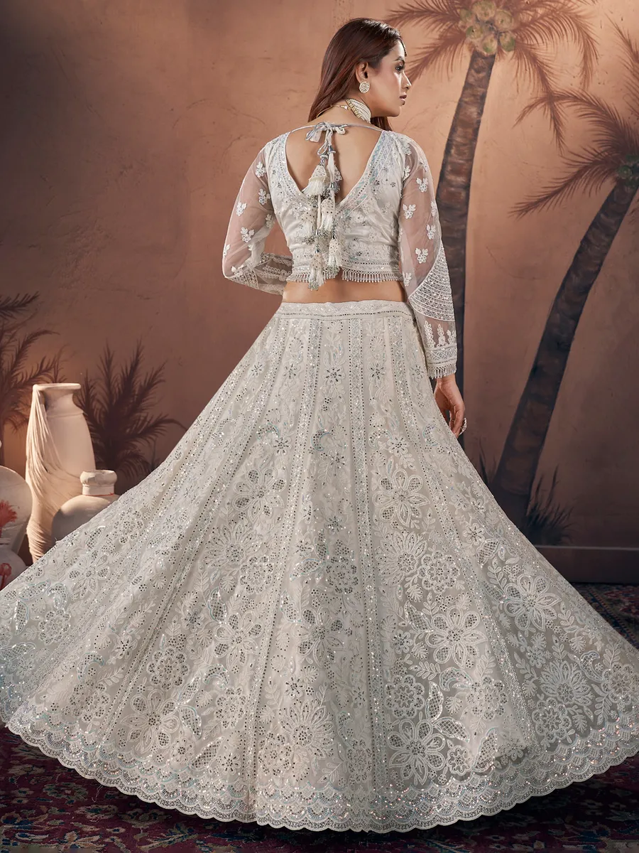 Trendy off-white net lehenga choli for bridal