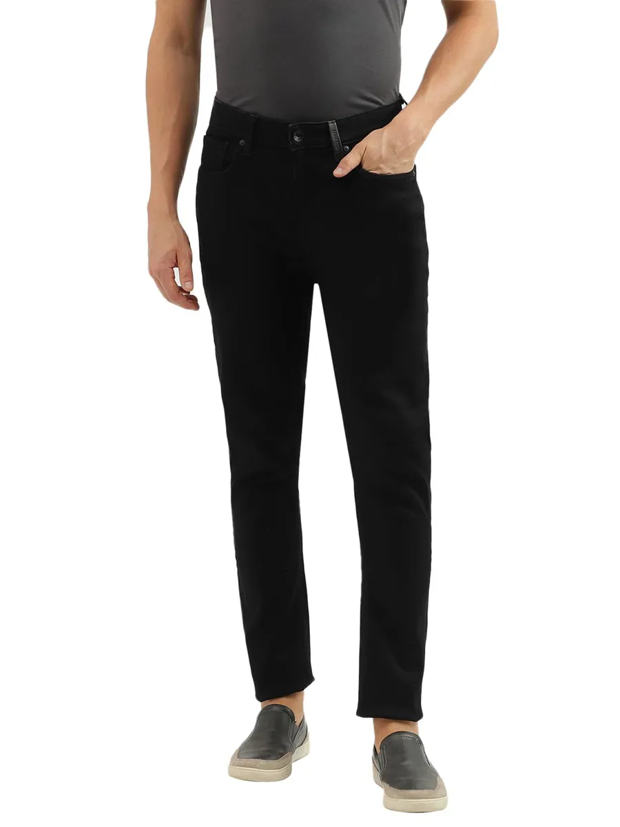 UCB black solid carrot fit jeans