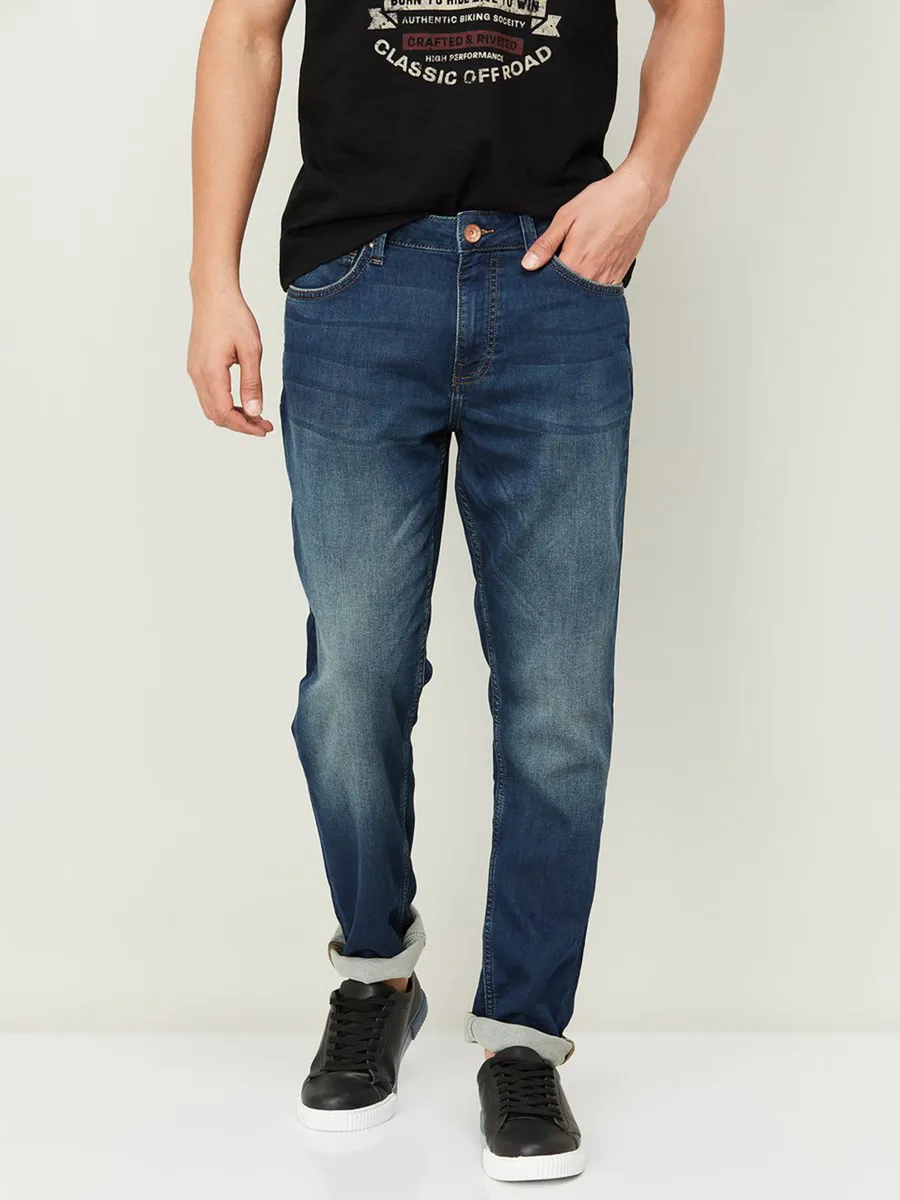 UCB dark blue jeans in washed