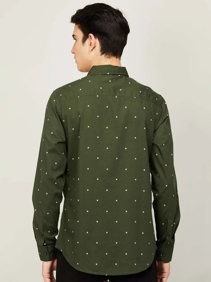 UCB printed style dark green tint shirt