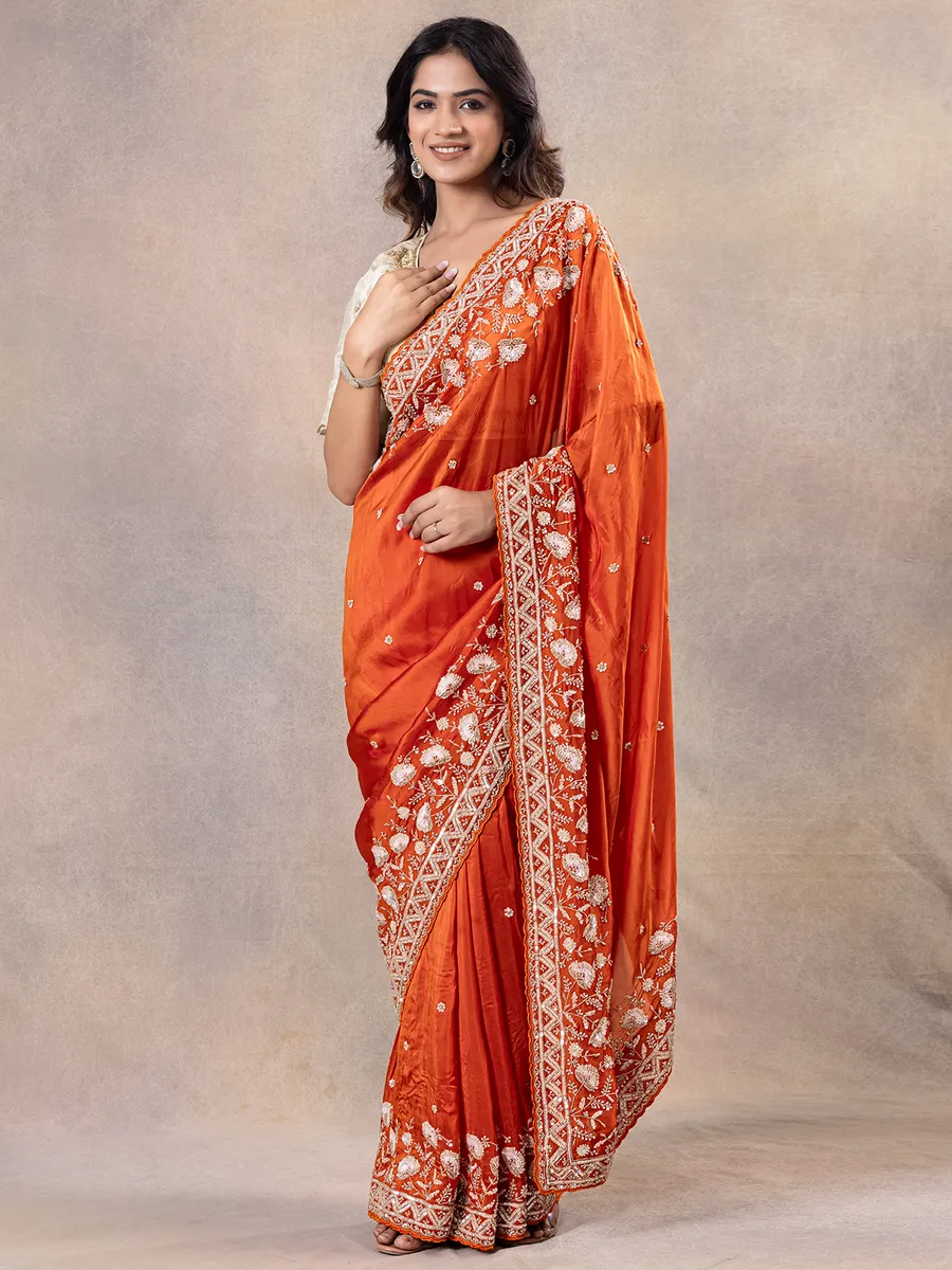 Wedding style orange silk saree