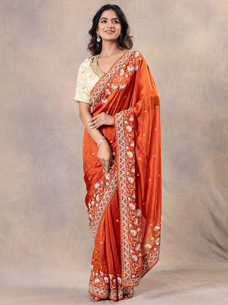 Wedding style orange silk saree