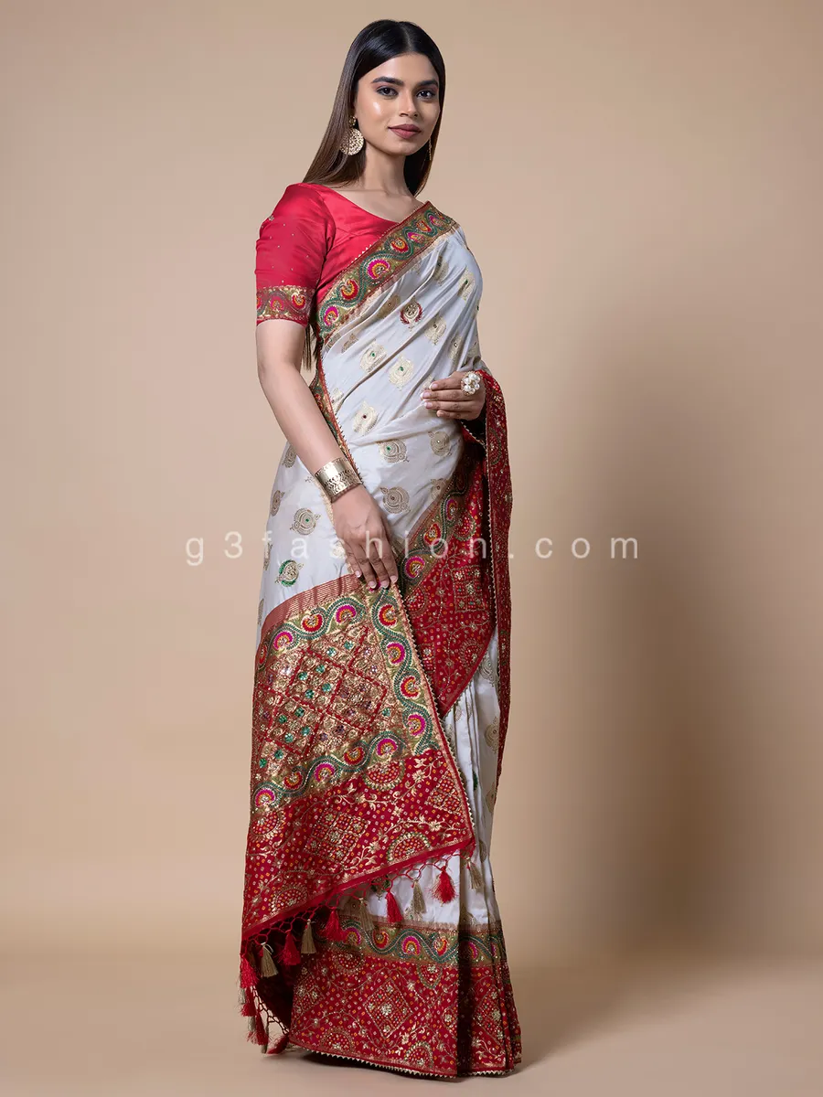 White silk saree with contrast border