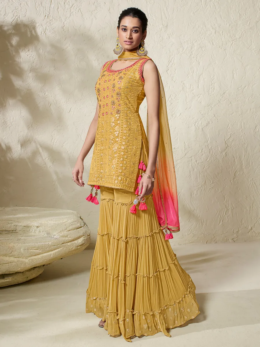 Yellow embroidery sharara suit in georgette