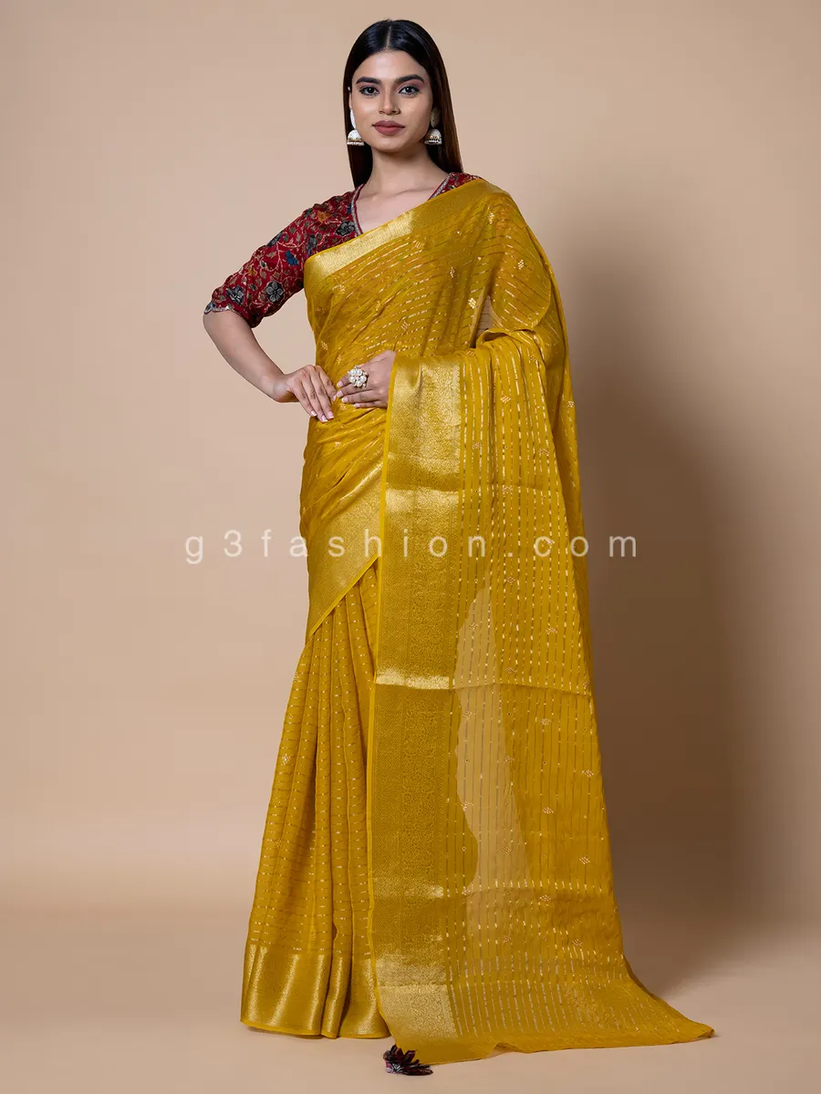 Yellow organza saree for festive