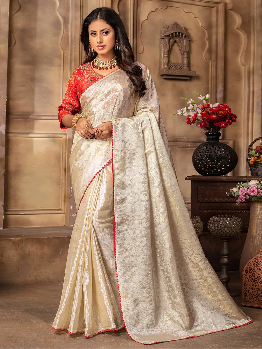 Stylish cream tissue silk saree for wedding