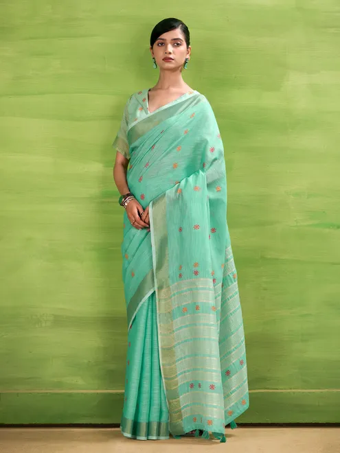 Aqua blue linen silk printed zari saree
