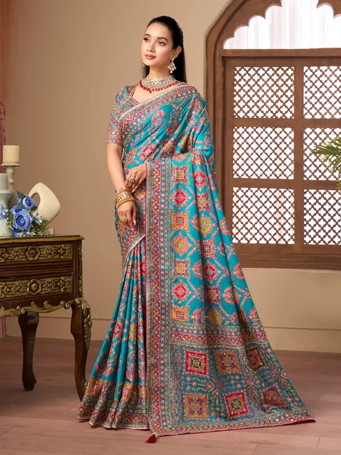 Aqua blue printed satin silk wedding wear saree