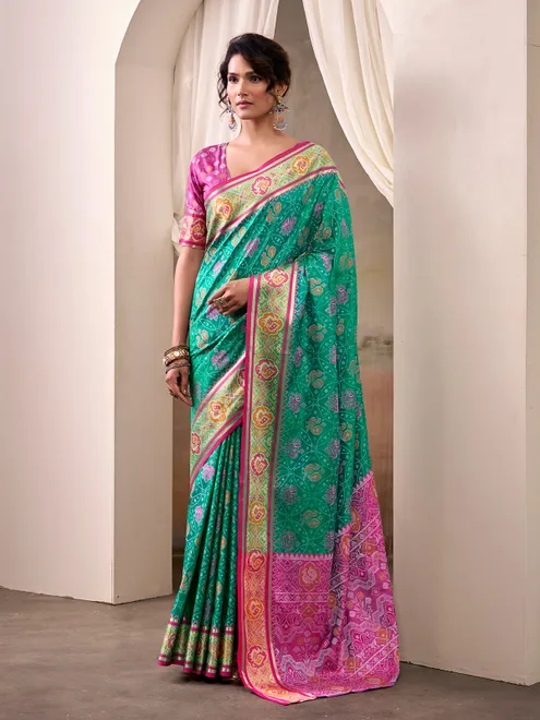 Aqua patola silk saree with pink blouse