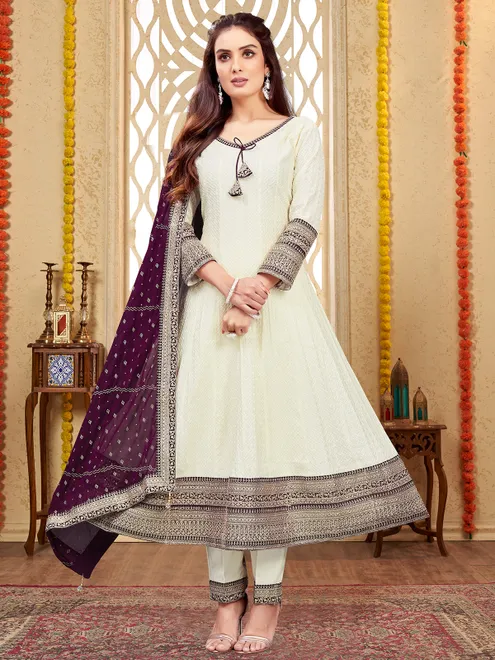Beautiful off-white and purple suit for festive