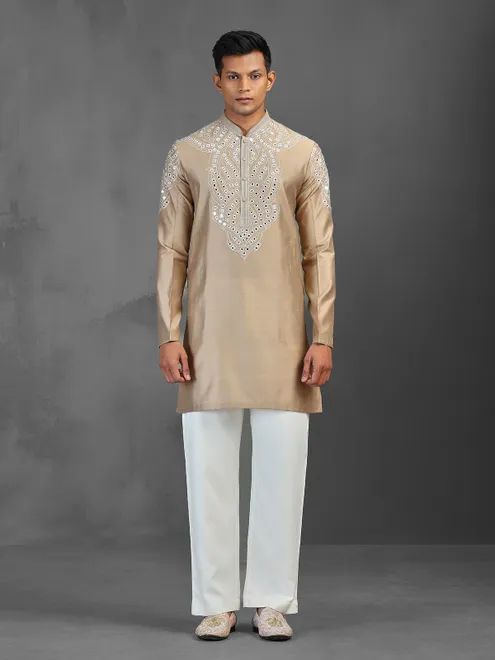 Beige art silk festive wear kurta suit with mirror work