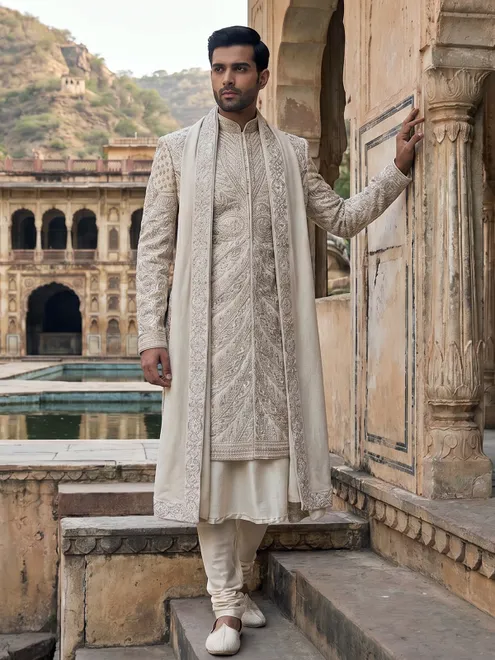 Beige embellished silk sherwani with cutwork elegance