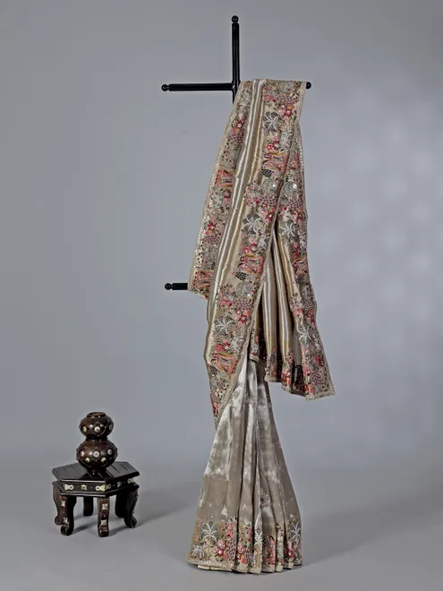 Beige embroidered tissue silk saree
