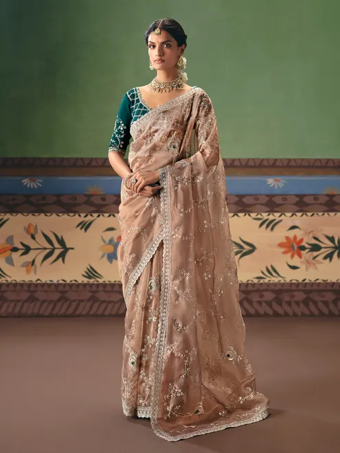 Beige fancy silk saree with rama green blouse
