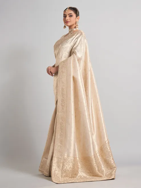 Beige kanjivaram silk saree for traditional wedding elegance