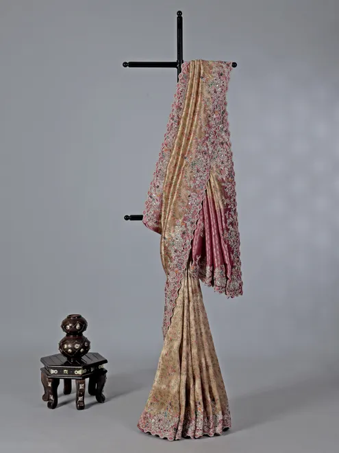 Beige kanjivaram with colorful motifs saree