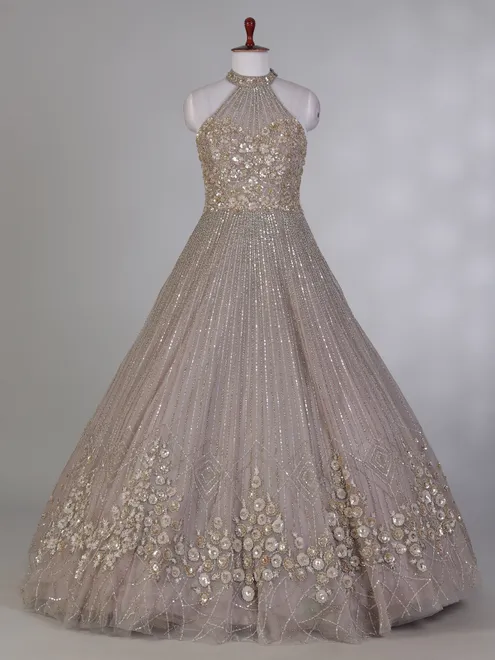 Beige net designer gown for party wear