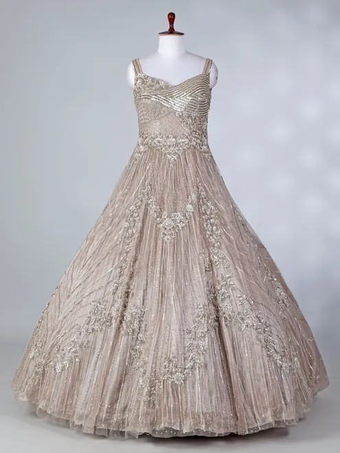 Beige net sleeveless sweetheart designer floor length gown