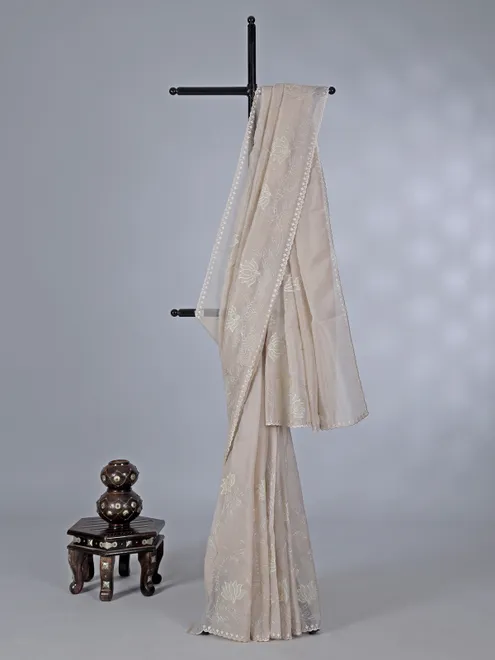 Beige organza saree with subtle resham and embroidery work