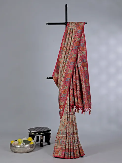 Beige pashmina silk saree with colorful motifs