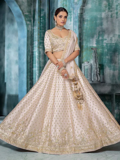 Beige raw silk bridal lehenga choli with beads