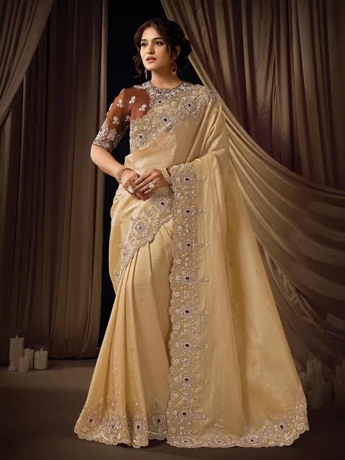 Beige reception wear jacquard slk saree