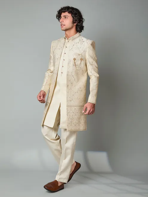 Beige silk embroidered indowestern set with brooch