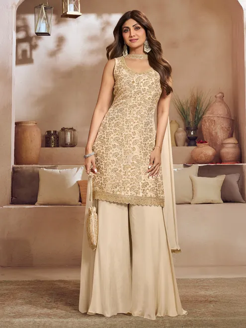 Beige silk palazzo set with zari highlights for festive