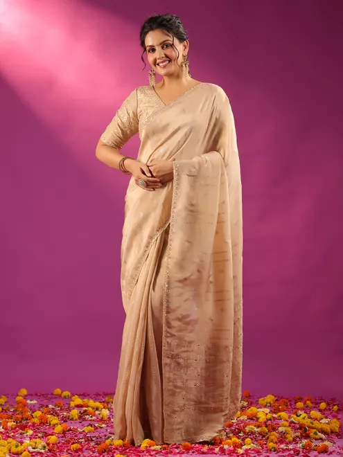 Beige silk saree for festive celebration