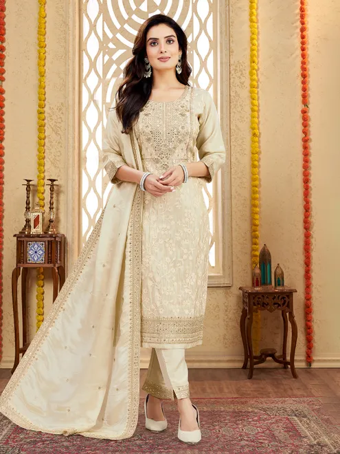 Beige silk suit with zardosi and sequin charm