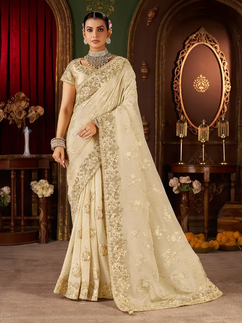 Beige soft silk mirror work and embroidered saree