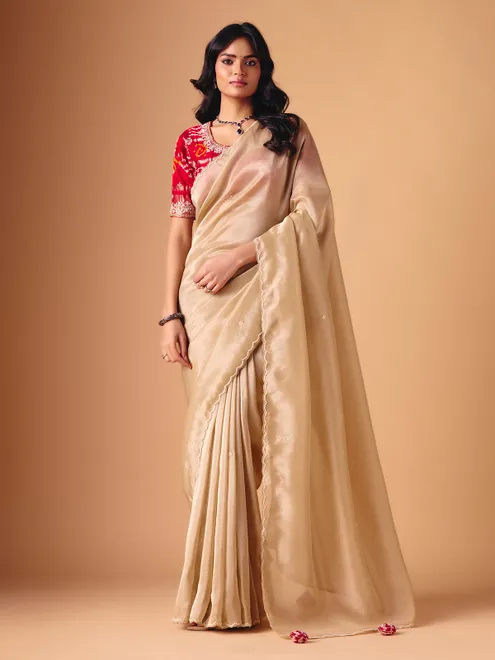 Beige tissue silk reception wear saree