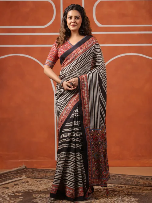 Black muslin printed saree with ready made blouse