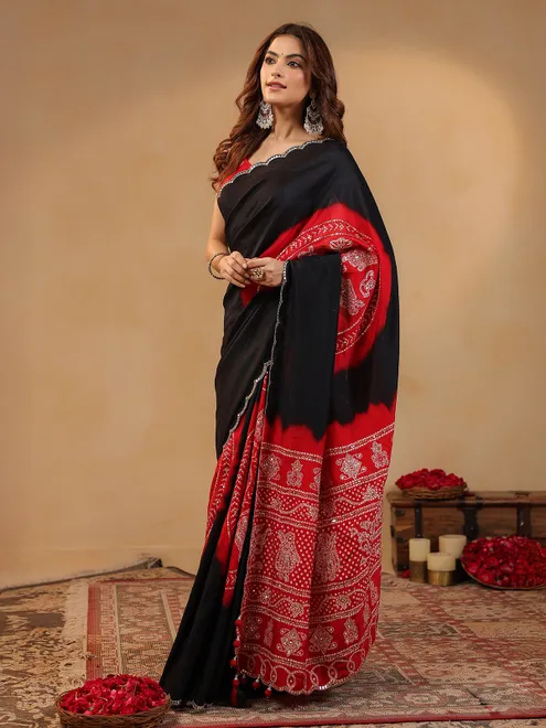 Black printed silk saree with aabla accents