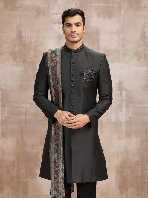 Black silk sherwani styled with dupatta