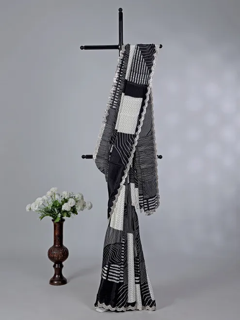Black white crepe silk reception wear saree