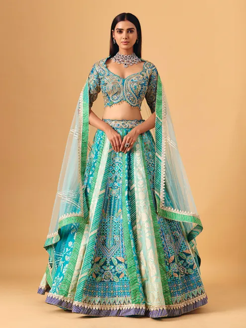 Blue silk lehenga choli with zardosi and gota detailing