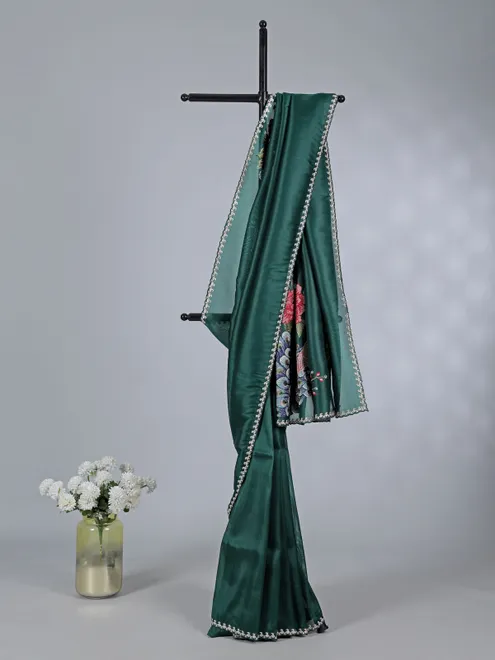 Bottle green tissue silk saree with peacock work