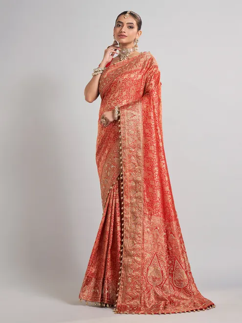 Bridal red kanjivaram silk saree with rich zari detailing